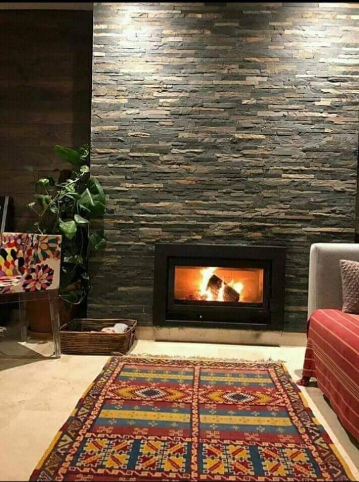 Cheminée en pierre naturelle — réalisation 1